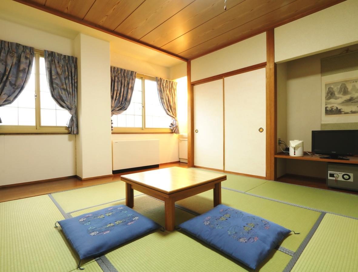 Hakuba Tsugaike Sunrise Tanne Hotel Otari Екстериор снимка